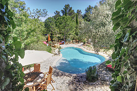 view of the pool from the bathroom