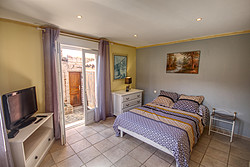 Spacious bedroom at La Pivoine holiday cottage
